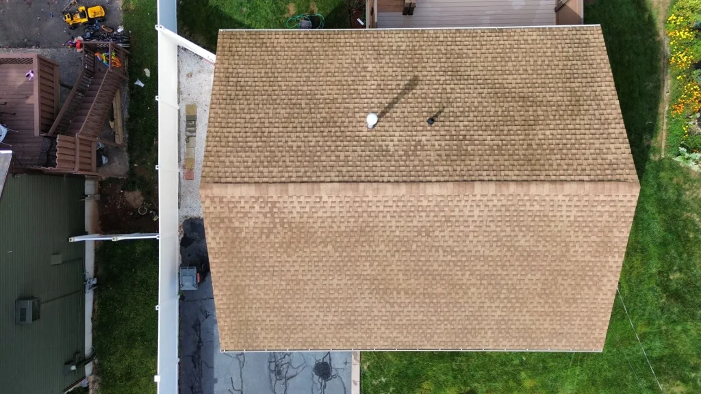 soft-wash-roof-cleaning-hartford-county-ct Soft wash roof cleaning in Hartford County CT — low-pressure treatment removes black streaks, algae, and moss without damaging shingles